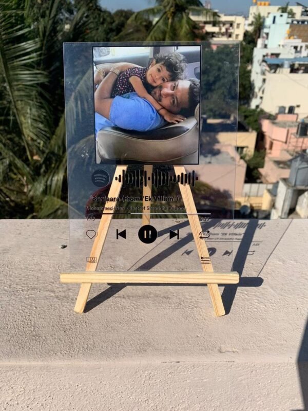 Spotify Pank with wooden stand.